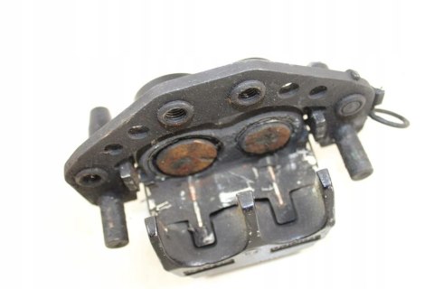KAWASAKI GPX600 R ZACISK HAMULCOWY LEWY PRZÓD
