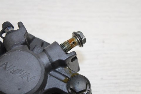 SUZUKI DL1000 V-STROM ZACISK HAMULCOWY TYŁ